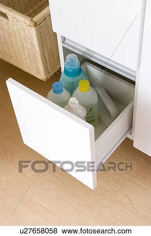 Stock Photo - Detergents in drawer. Fotosearch