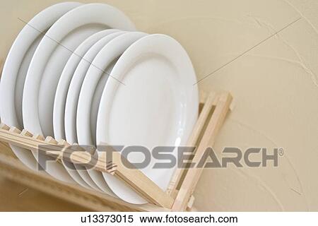 Dishes in rack View Large Photo Image Stock Photography - Dishes in rack. Fotosearch