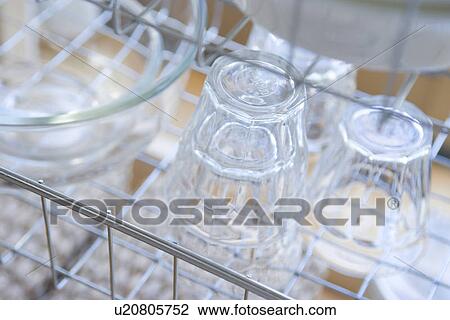 Stock Image - Glasses in rack. Fotosearch
