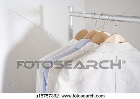 Shirts on hangers View Large Photo Image Stock Image - Shirts on hangers. Fotosearch