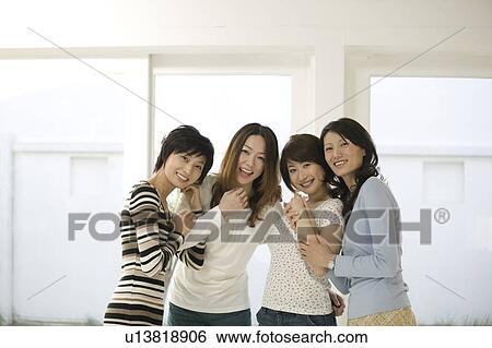 Portrait of four women View Large Photo Image Stock Photograph - Portrait of four women. Fotosearch