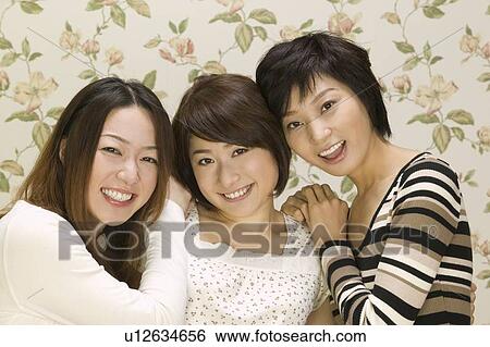 Stock Photograph - Portrait of three young women. Fotosearch