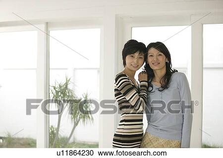 Portrait of two women View Large Photo Image Stock Image - Portrait of two women. Fotosearch