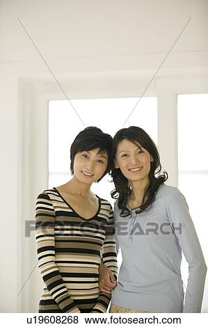 Portrait of two women View Large Photo Image Stock Photo - Portrait of two women. Fotosearch