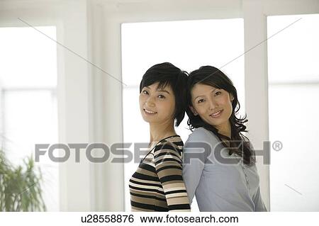 Portrait of two women View Large Photo Image Stock Photograph - Portrait of two women. Fotosearch