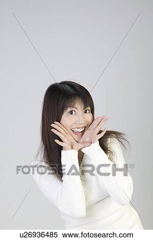 Young woman calling View Large Photo Image Stock Photography - Young woman calling. Fotosearch