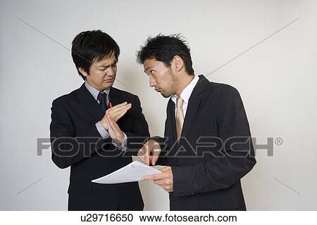 Stock Image - Businessman asking favor. Fotosearch