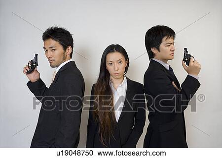 Stock Image - Portrait of young business people. Fotosearch