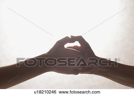 Two people doing thumb wrestling View Large Photo Image Stock Photograph - Two people doing thumb wrestling. Fotosearch