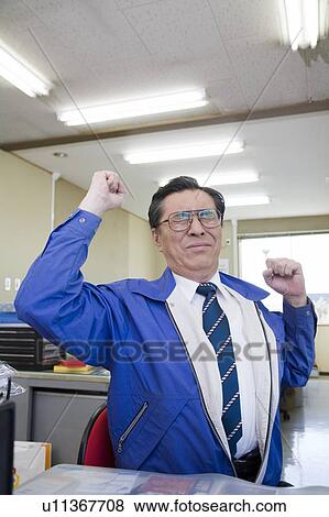 Stock Photo - Mature businessman stretching. Fotosearch