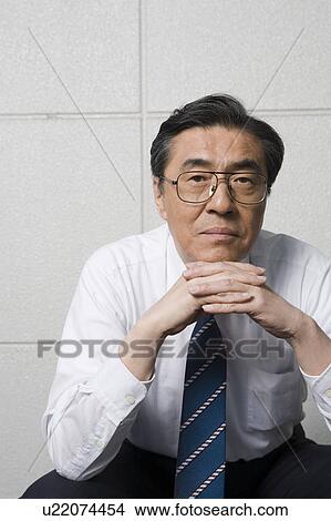 Portrait of mature businessman View Large Photo Image Picture - Portrait of mature businessman. Fotosearch