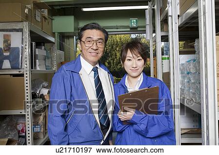 Portrait of warehouse staffs View Large Photo Image Stock Photo - Portrait of warehouse staffs. Fotosearch