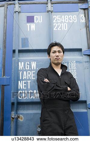 Portrait of young worker View Large Photo Image Stock Image - Portrait of young worker. Fotosearch