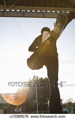 Stock Photo - Warehouse worker running. Fotosearch
