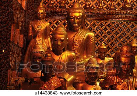Stock Image - Array of Buddhas. Fotosearch