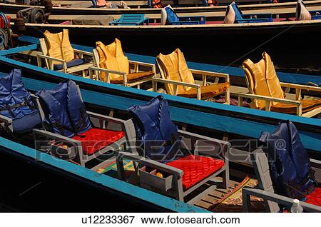 Empty docked tour boats View Large Photo Image Stock Photo - Empty docked tour boats. Fotosearch