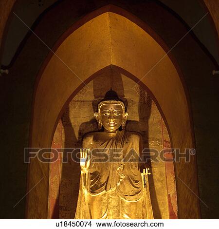 Picture - Golden Buddha in Bagan Buddhist Temple. Fotosearch
