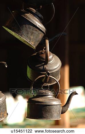 Hanging kettles View Large Photo Image Stock Image - Hanging kettles. Fotosearch