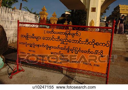 Stock Photography - Sign posted outside Golden Rock. Fotosearch
