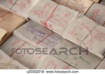 Stock Photo - Stack of tied pamphlets. Fotosearch