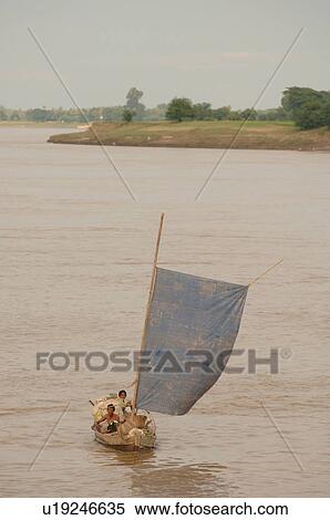 Stock Photography - Sailboat on on the Irrawaddy River. Fotosearch