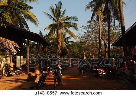 Stock Photo - Road through village in Cambodia. Fotosearch