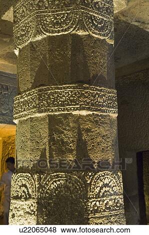 Stock Photo - Close-up of carvings on a column, Ajanta, Maharashtra, India. Fotosearch