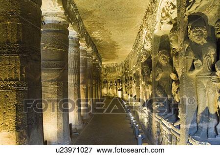 Stock Photo - Columns and statues in a cave, Ajanta, Maharashtra, India. Fotosearch