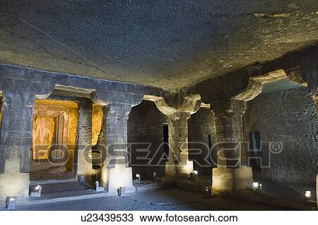 Stock Image - Columns in a cave, Ajanta, Maharashtra, India. Fotosearch