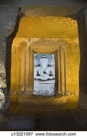 Statue of Buddha in a cave, Ajanta, Maharashtra, India View Large Photo Image Stock Photo - Statue of Buddha in a cave, Ajanta, Maharashtra, India. Fotosearch