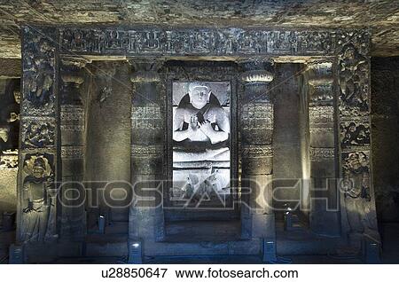 Stock Photo - Statue of Buddha in a cave, Ajanta, Maharashtra, India. Fotosearch