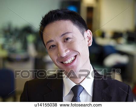 Businessman in office, close-up, portrait View Large Photo Image Stock Photo - Businessman in office, close-up, portrait. Fotosearch