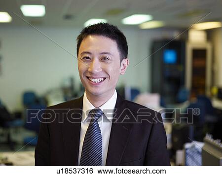 Businessman in office, close-up, portrait View Large Photo Image Stock Photograph - Businessman in office, close-up, portrait. Fotosearch