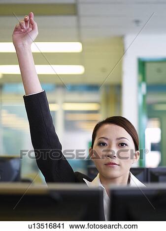 Businesswoman holding hand in air View Large Photo Image Stock Image - Businesswoman holding hand in air. Fotosearch