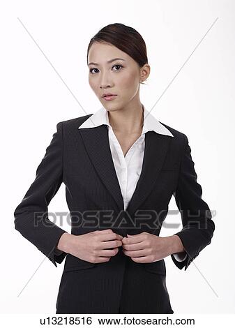 Stock Photograph - Businesswoman Getting Dressed. Fotosearch