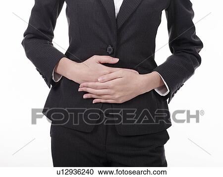 Businesswoman having stomachache View Large Photo Image Stock Image - Businesswoman having stomachache. Fotosearch