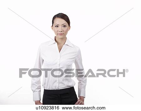 Businesswoman in office, smiling, portrait View Large Photo Image Stock Photograph - Businesswoman in office, smiling, portrait. Fotosearch