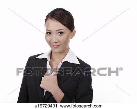 Stock Image - Businesswoman thumbs up. Fotosearch