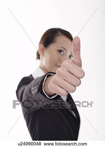 Businesswoman thumbs up View Large Photo Image Stock Photo - Businesswoman thumbs up. Fotosearch