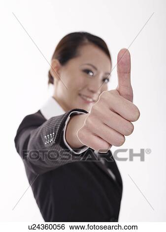 Businesswoman thumbs up View Large Photo Image Stock Photograph - Businesswoman thumbs up. Fotosearch