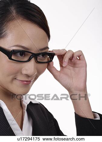 Stock Photography - Businesswoman with spectacles. Fotosearch