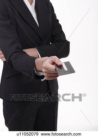 Hand holding a Credit card View Large Photo Image Stock Photo - Hand holding a Credit card. Fotosearch