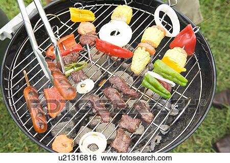 Stock Photograph - Food on Barbecue Grill. Fotosearch