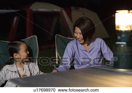 Mother and Daughter Talking at Table View Large Photo Image Stock Image - Mother and Daughter Talking at Table. Fotosearch