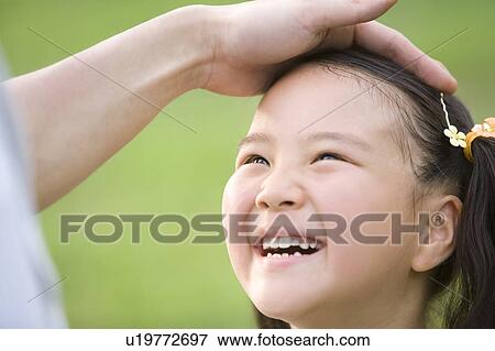 Stock Photo - Smiling Girl . Fotosearch