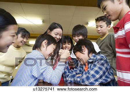 Arm Wrestling In The Classroom View Large Photo Image Stock Image - Arm Wrestling In The Classroom. Fotosearch