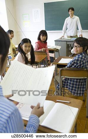 Elementary Student Reading Aloud in Class View Large Photo Image Stock Photograph - Elementary Student Reading Aloud in Class. Fotosearch