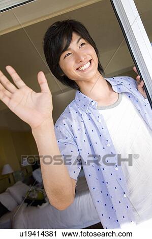 Stock Image - Smiling young man, Saipan. Fotosearch