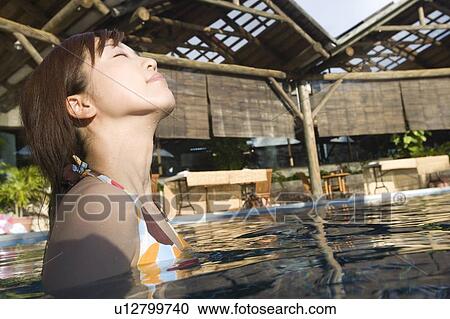 Young woman in a swimming pool, Saipan View Large Photo Image Stock Image - Young woman in a swimming pool, Saipan . Fotosearch