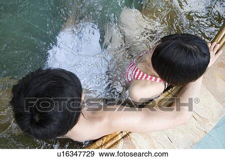 Stock Photo - Couple in a Jacuzzi, Saipan. Fotosearch